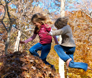 kids-jumping-in-leaves-2